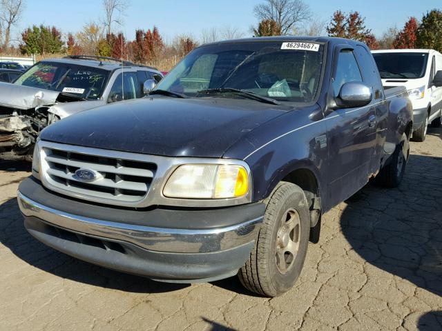 1FTRX07L7XKB93572 - 1999 FORD F150 BLUE photo 2