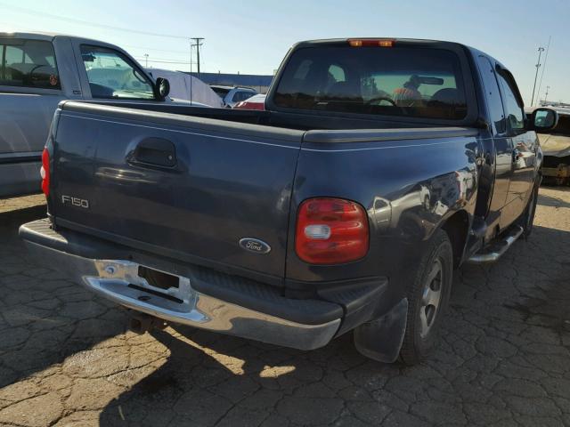1FTRX07L7XKB93572 - 1999 FORD F150 BLUE photo 4
