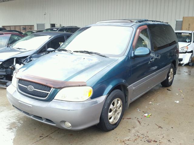 KNDUP131246600562 - 2004 KIA SEDONA GREEN photo 2