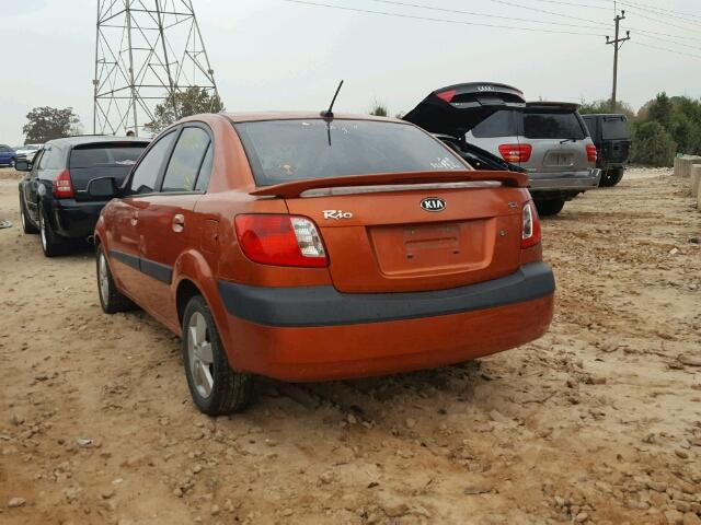 KNADE223996446015 - 2009 KIA RIO BASE ORANGE photo 3