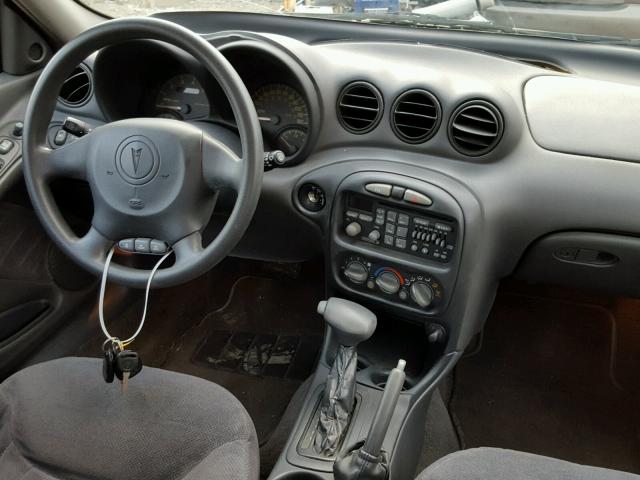 1G2NE52E8XC554283 - 1999 PONTIAC GRAND AM S ვერცხლისფერი ფოტო 9