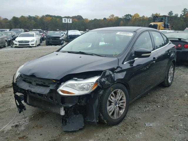 1FAHP3H21CL404939 - 2012 FORD FOCUS SEL BLACK photo 2