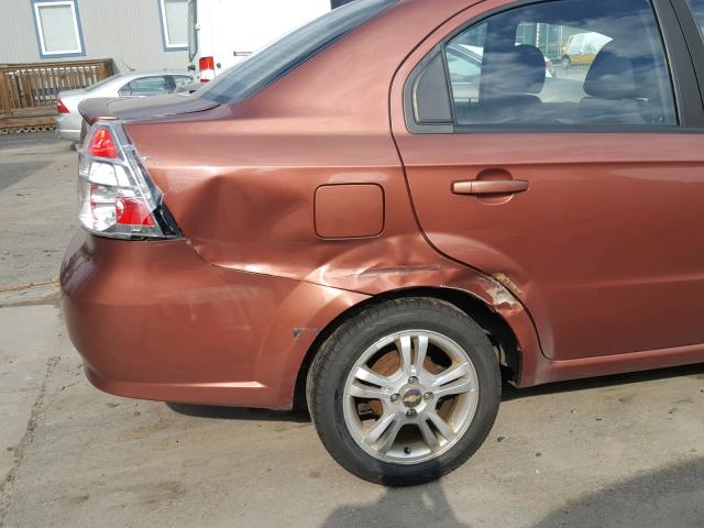 KL1TD5DE8BB258589 - 2011 CHEVROLET AVEO LS ORANGE photo 9