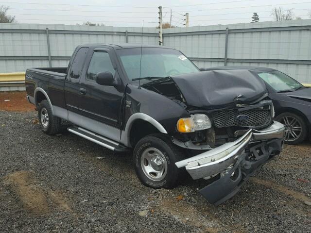 1FTRX18W3YNA48382 - 2000 FORD F150 BLACK photo 1