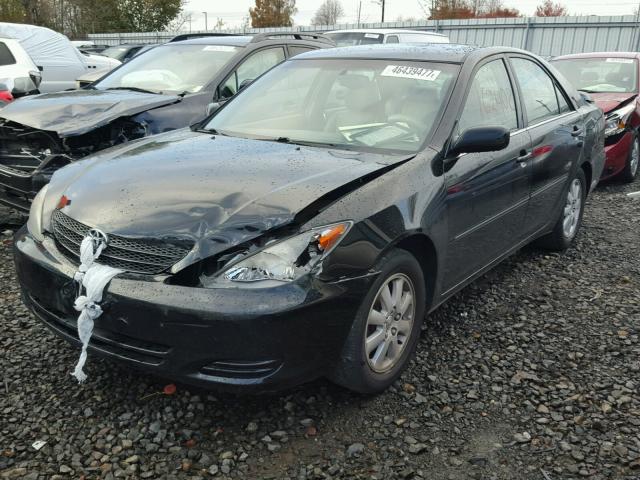 JTDBE32K620113058 - 2002 TOYOTA CAMRY LE შავი ფოტო 2