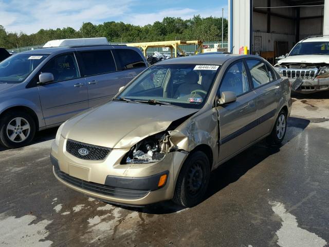 KNADE123866092705 - 2006 KIA RIO GOLD photo 2