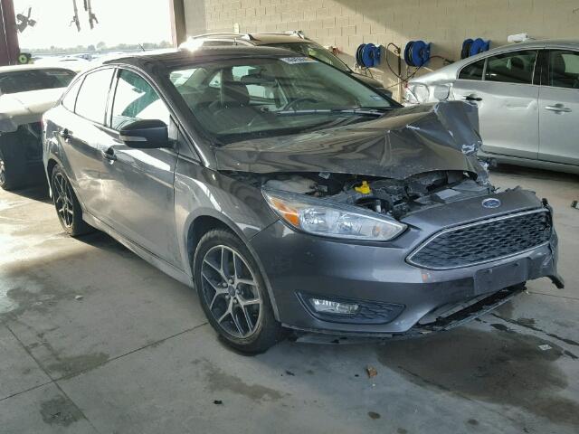 1FADP3F23FL218874 - 2015 FORD FOCUS SE GRAY photo 1