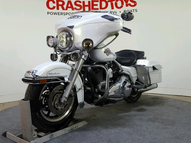 1HD1FC4177Y646170 - 2007 HARLEY-DAVIDSON FLHTCUI WHITE photo 4