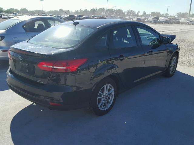 1FADP3F20FL335568 - 2015 FORD FOCUS SE BLACK photo 4