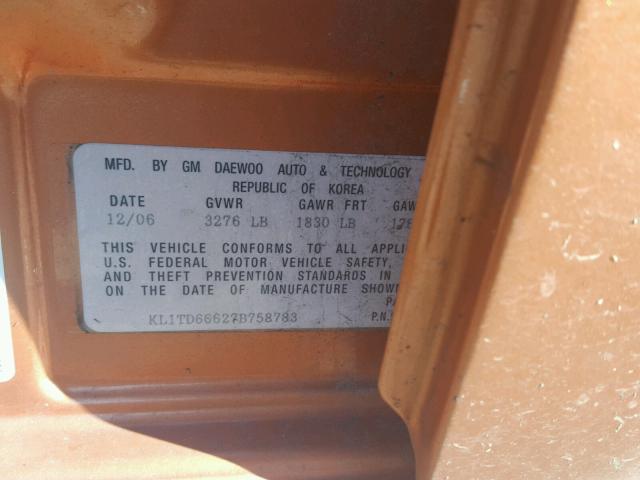 KL1TD66627B758783 - 2007 CHEVROLET AVEO BASE Pomarańczowy zdjęcie 10