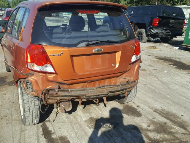 KL1TD66627B758783 - 2007 CHEVROLET AVEO BASE Pomarańczowy zdjęcie 9