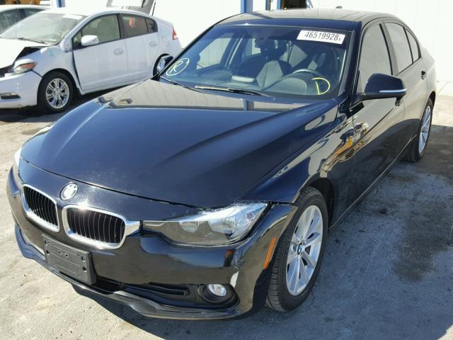 WBA8A9C50GK619236 - 2016 BMW 320 I BLACK photo 2