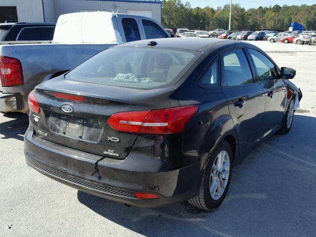 1FADP3F21FL208912 - 2015 FORD FOCUS SE BLACK photo 4