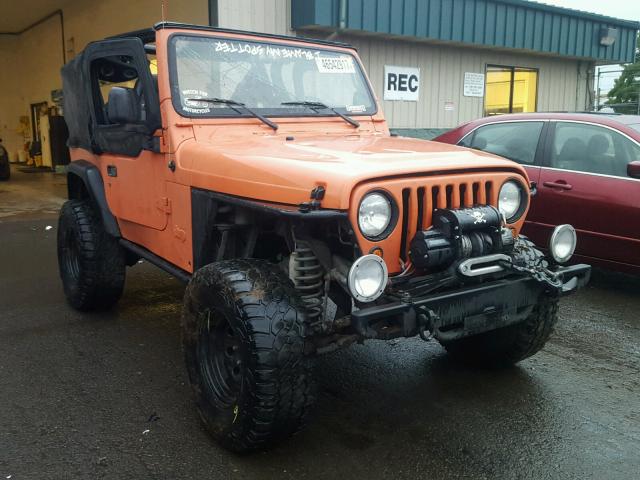 1J4FA49S83P331434 - 2003 JEEP WRANGLER / ORANGE photo 1