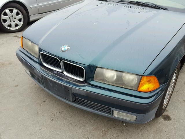 WBABK5328SEC85680 - 1995 BMW 318 IC TEAL photo 7