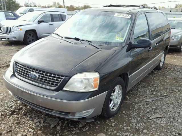 2FMDA58234BB00613 - 2004 FORD FREESTAR L BLACK photo 2