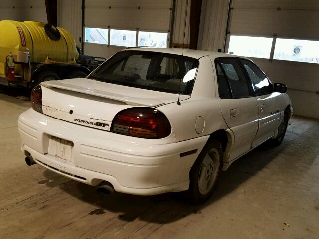 1G2NW52T2VC723061 - 1997 PONTIAC GRAND AM G WHITE photo 4