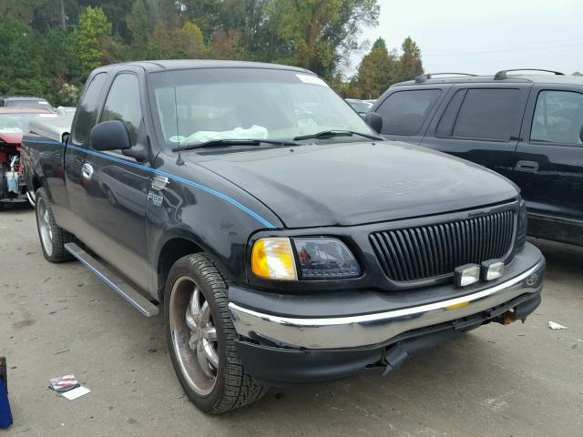 1FTRX17242NA09452 - 2002 FORD F150 BLACK photo 1