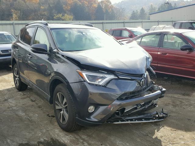 JTMRFREV1HJ704390 - 2017 TOYOTA RAV4 XLE GRAY photo 1