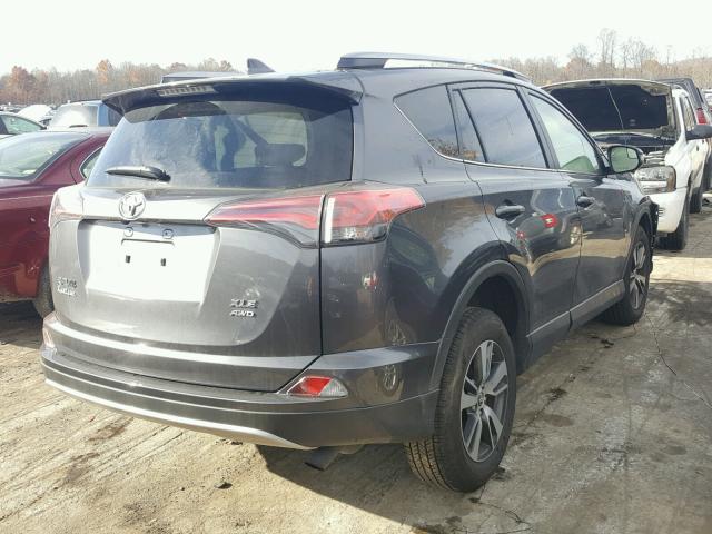 JTMRFREV1HJ704390 - 2017 TOYOTA RAV4 XLE GRAY photo 4