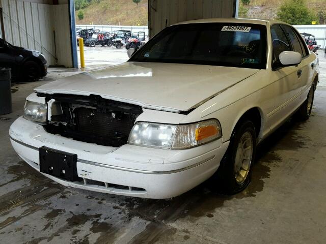 2FAFP74W3XX176281 - 1999 FORD CROWN VICT WHITE photo 2