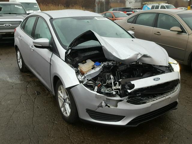 1FADP3F27FL340217 - 2015 FORD FOCUS SE SILVER photo 1