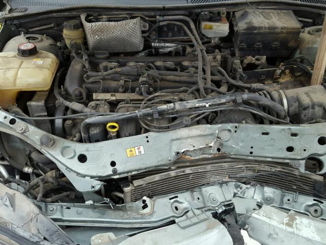 1FAFP34N85W195949 - 2005 FORD FOCUS ZX4 GREEN photo 7