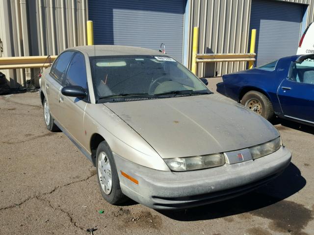 1G8ZH5284XZ139967 - 1999 SATURN SL1 TAN photo 1