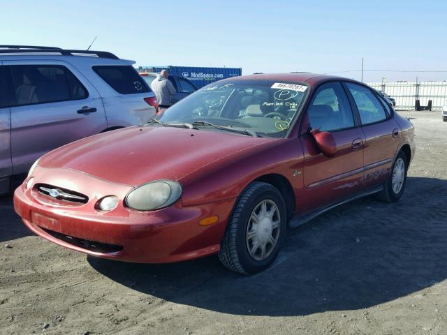 1FAFP532XXG241815 - 1999 FORD TAURUS SE RED photo 2