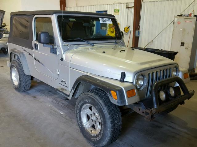 1J4FA49SX4P795696 - 2004 JEEP WRANGLER / GRAY photo 1