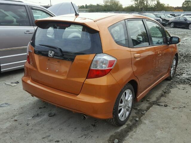 JHMGE884X9S028443 - 2009 HONDA FIT ORANGE photo 4