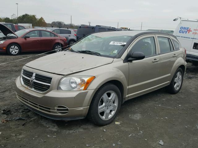 1B3HB48A49D259275 - 2009 DODGE CALIBER SX GOLD photo 2