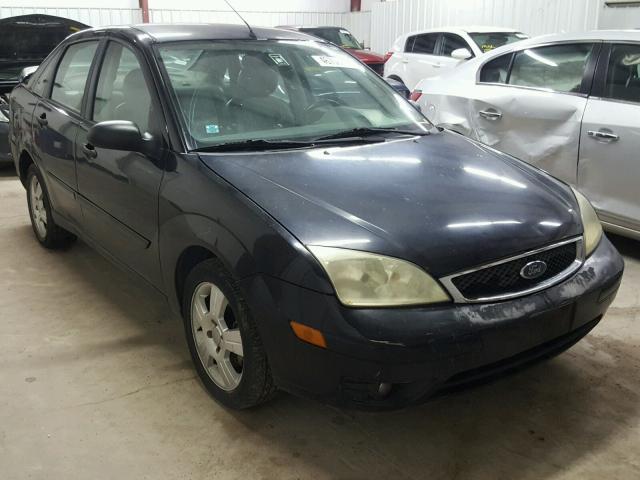 1FAFP34N55W137927 - 2005 FORD FOCUS ZX4 BLACK photo 1