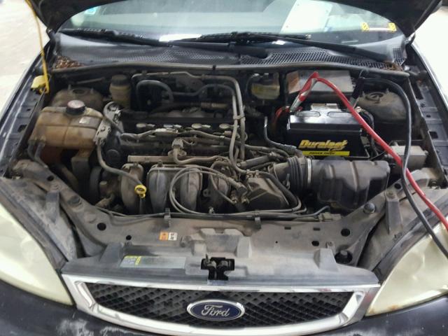 1FAFP34N55W137927 - 2005 FORD FOCUS ZX4 BLACK photo 7