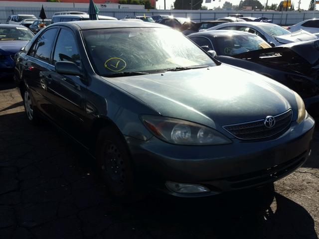 JTDBE32K120029553 - 2002 TOYOTA CAMRY LE GREEN photo 1