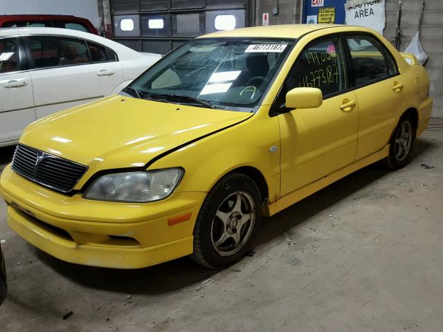 JA3AJ86E62U005006 - 2002 MITSUBISHI LANCER YELLOW photo 2