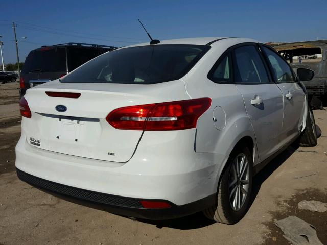 1FADP3F21HL229178 - 2017 FORD FOCUS SE WHITE photo 4