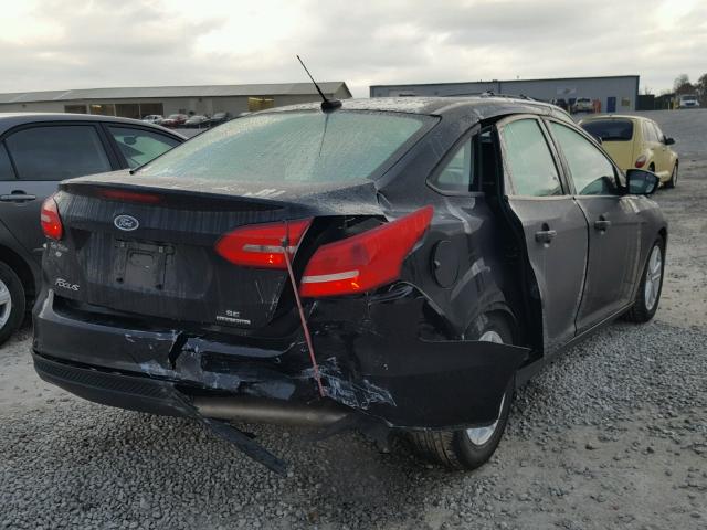 1FADP3F21FL242526 - 2015 FORD FOCUS SE BLACK photo 4