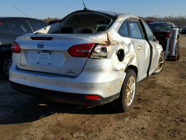 1FADP3F22GL394431 - 2016 FORD FOCUS SE SILVER photo 4