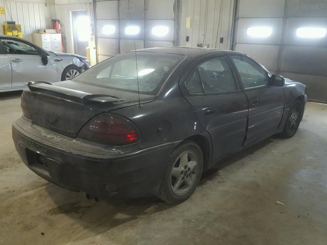 1G2NV52E91C168429 - 2001 PONTIAC GRAND AM G BLACK photo 4