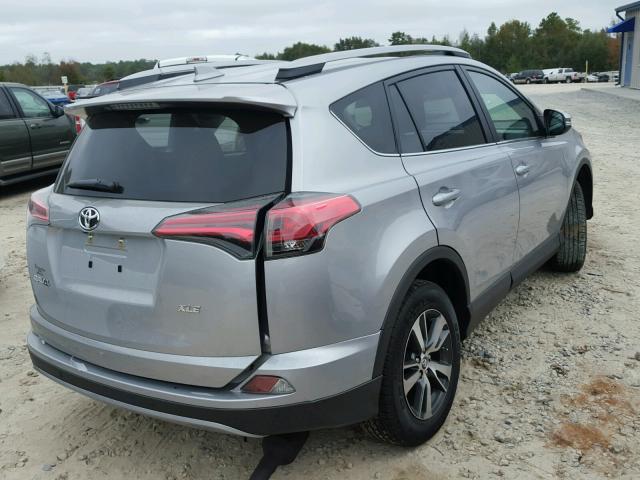 2T3WFREV6HW395262 - 2017 TOYOTA RAV4 XLE SILVER photo 4