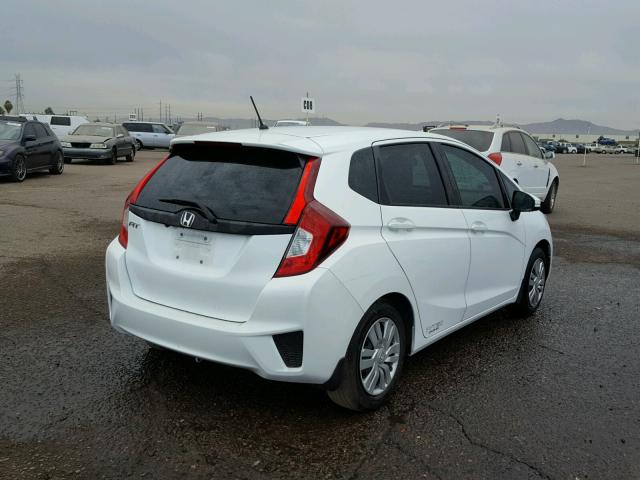 3HGGK5G59GM703449 - 2016 HONDA FIT LX WHITE photo 4