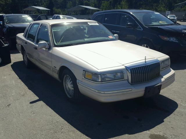 1LNLM83W4VY740011 - 1997 LINCOLN TOWN CAR C TAN photo 1