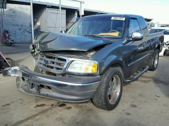 2FTRX17282CA13168 - 2002 FORD F150 GREEN photo 2