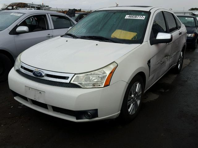 1FAHP37N99W129999 - 2009 FORD FOCUS SEL WHITE photo 2