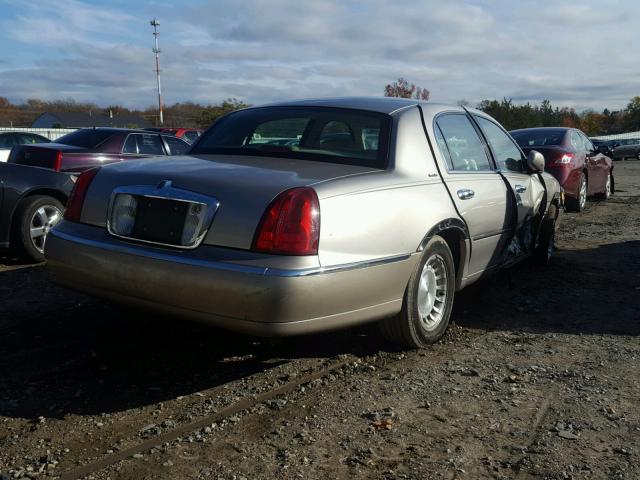 1LNHM81W3XY658203 - 1999 LINCOLN TOWN CAR E BEIGE photo 4