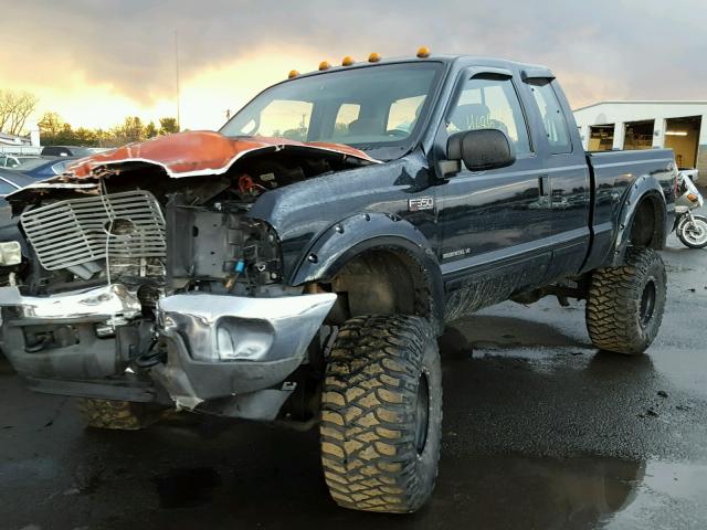 1FTSX31F32EA16370 - 2002 FORD F350 SRW S BLACK photo 2