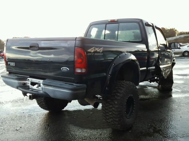 1FTSX31F32EA16370 - 2002 FORD F350 SRW S BLACK photo 4