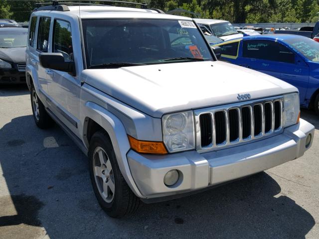 1J8HH48K09C552479 - 2009 JEEP COMMANDER SILVER photo 1