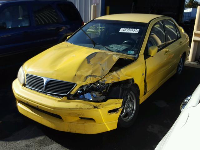 JA3AJ86E42U073367 - 2002 MITSUBISHI LANCER OZ YELLOW photo 2